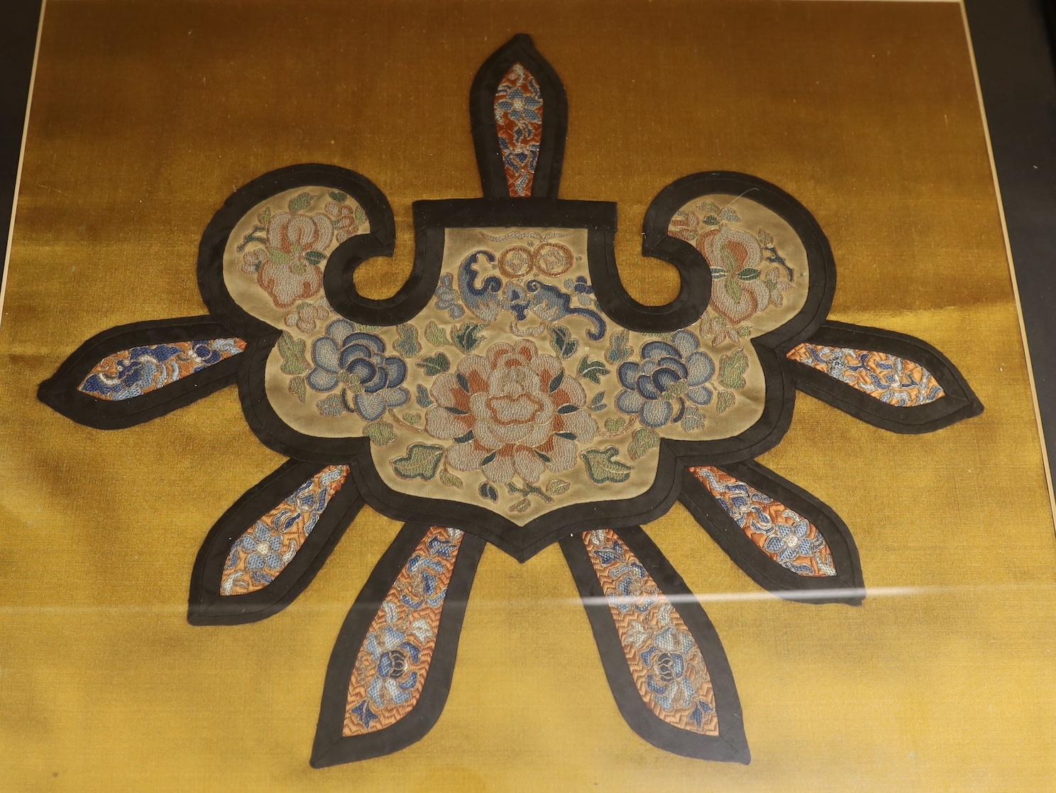 A framed Chinese embroidered silk collar, overall 55 x 63cm